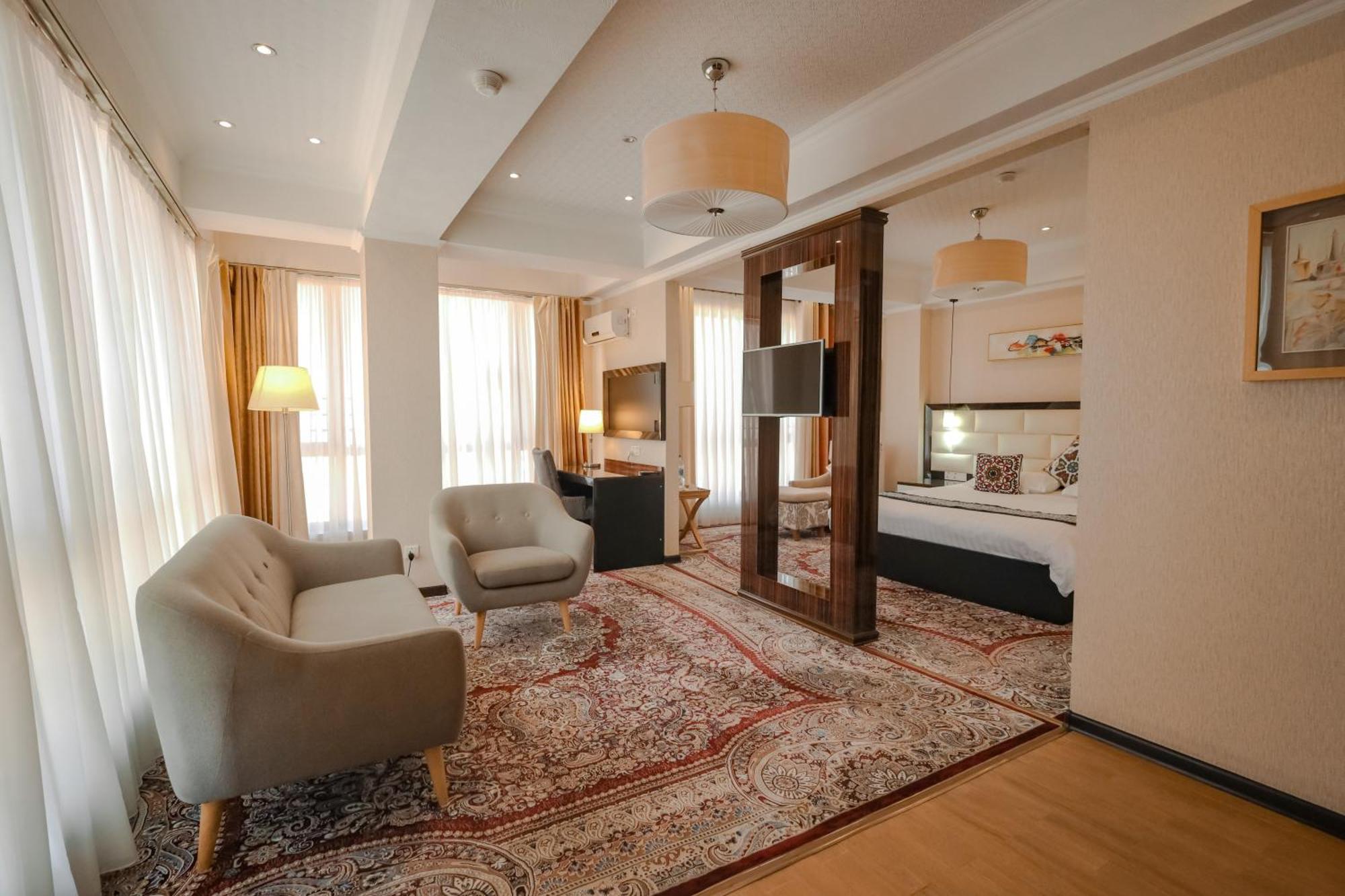 Hotel Atlas ดูแชนเบอ ภายนอก รูปภาพ